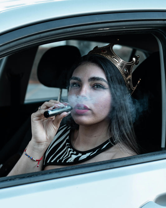 Woman Vaping Inside the Car